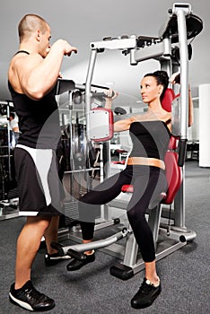 Female gym exercise trainer