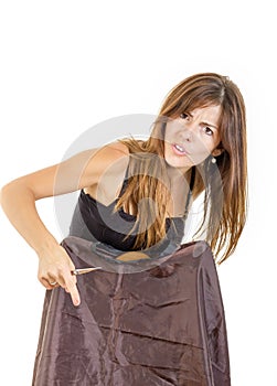 female hairdresser with comb and scissors waiting impatiently for customer