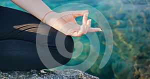 Female hand in aakaash mudra yogic gesture