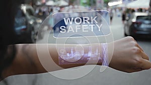 Female hand activates hologram Work safety