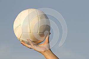 Female hand ball sky