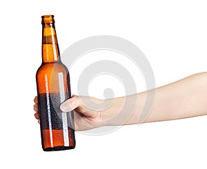 Female hand with beer brown bottle