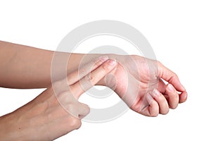 Female hand checking pulse on white background.