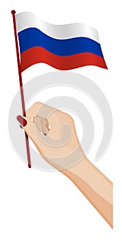 Female hand gently holds small flag of Russia, Russian Federation. Holiday design element. Cartoon vector on white background