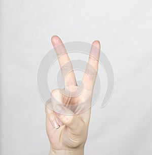 Female hand gesture is all good on a white background symbol