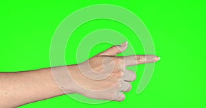 Female hand gestures on green screen: pointing