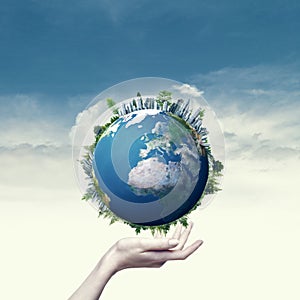 Female hand hold 3D rendered Earth globe.