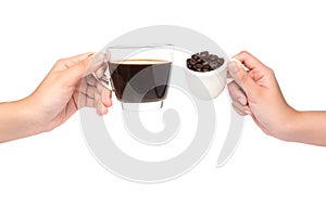 Female hand hold cup of coffee beans on white backgroun