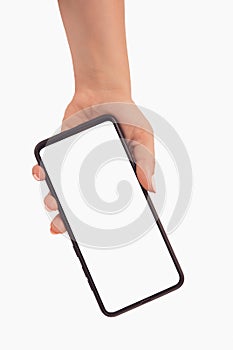 Female hand holding black cellphone with white screen at isolated background from top to bottom. close up hand hold phone isolated
