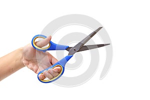 Female hand holding a blue scissors