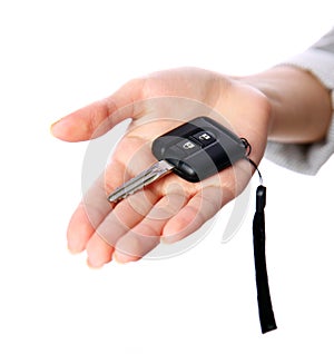 Female hand holding car keys