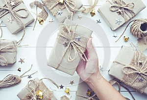 Female hand holding christmas presents gift box.collection