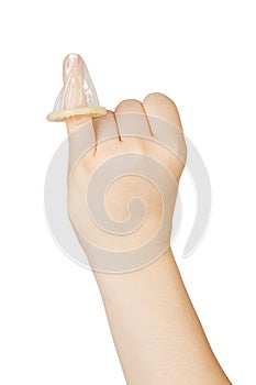 Female hand holding condom