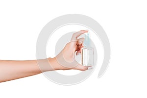 Female hand holding cream bottle of lotion isolated. Girl give tube cosmetic products on white background