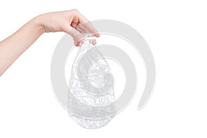 Female hand holding empty crushed plastic bottle isolated on white. Recyclable waste. Recycling, reuse, garbage disposal, resource