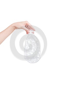 Female hand holding empty crushed plastic bottle isolated on white. Recyclable waste. Recycling, reuse, garbage disposal