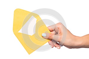 Female hand holding  envelope isolated on white background