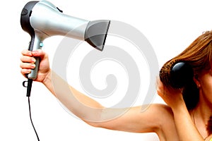 Female hand holding hairdryer