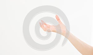 Female hand holding invisible items, woman`s palm making gesture while showing small amount of something on white isolated