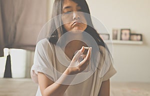 Female hand holding a medicine,Woman hands with pills on spilling pills but do not take a medicine ,emotional face expression photo