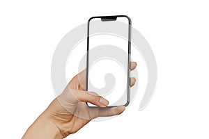 Female hand holding modern mobile phone with blank screen with copyspace isolated at white background. Cellphone mockup