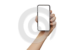 Female hand holding modern mobile phone with blank screen isolated at white background. Cellphone mockup