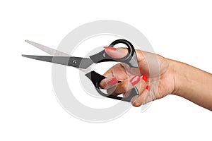 Female hand holding a scissor