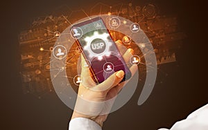 Hand using smartphone with technology concept