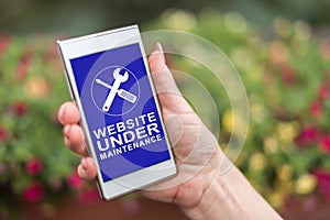Website maintenance concept on a smartphone