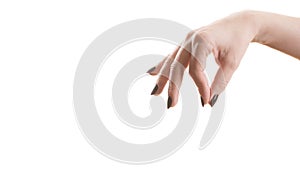 Female hand holding something with two fingers