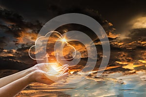 female hand holding a symbol of cloud computing cloud technology