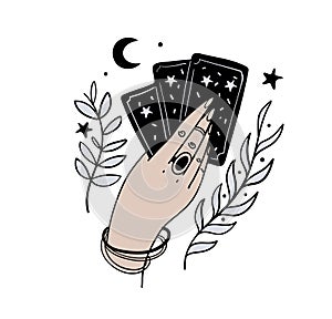 Female hand holds magic tarot cards, boho tattoo, symbol of fortune-telling and prediction, icon for witch, astrology