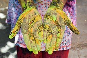 Female hand in holi festible