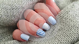 Female hand manicure  creative  sweater slow motion  delicate