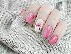 Female hand nails beautiful manicure   design  elegant  sweater clothing