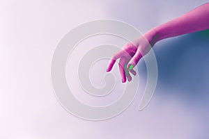 Female hand in neon acid purple color, minimalism