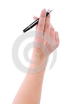 Female hand with a pen for a signature