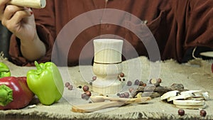 Female Hand Pounding The Spices