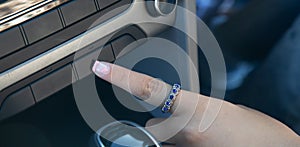 Female hand press car button