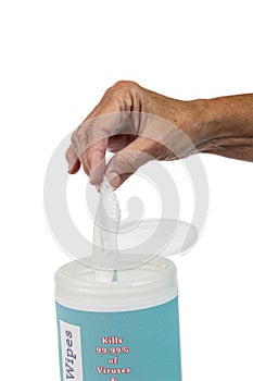Female Hand Pulling Out a Disinfectant Wipe Isolated