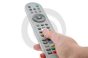 Female hand with remote control