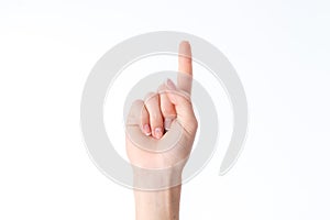 Female hand showing the gesture with raised up one finger isolated on white background