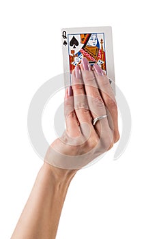 Female hand showing queen of spades card