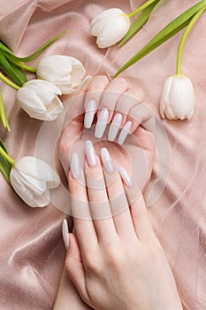 Female hand with spring nail design