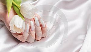 Female hand with spring nail design