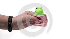 Female hand squeezing anti stress toy.  on white background