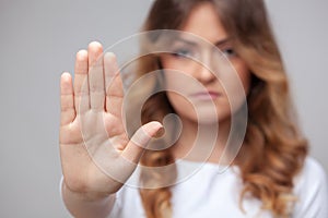 Female hand stop sign