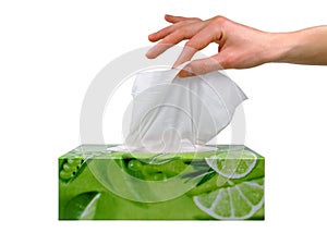 Female hand taking a tissue from a box photo