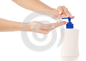 Female hand using liquid soap