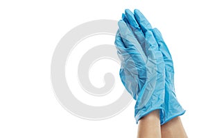 Female hands in blue crumpled medical gloves. Protection and precautions. Isolated on a white background. Close-up. Space for text